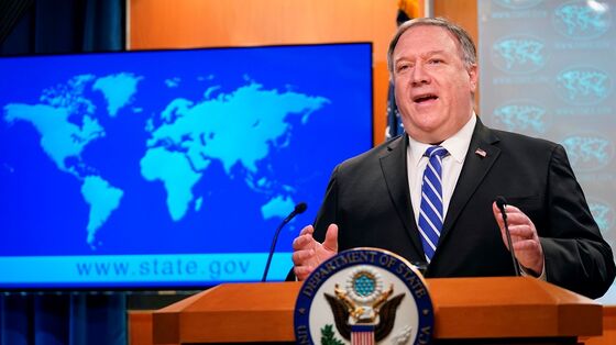 Pompeo Steps Up Criticism of China But Eases Off Wuhan Lab Claim