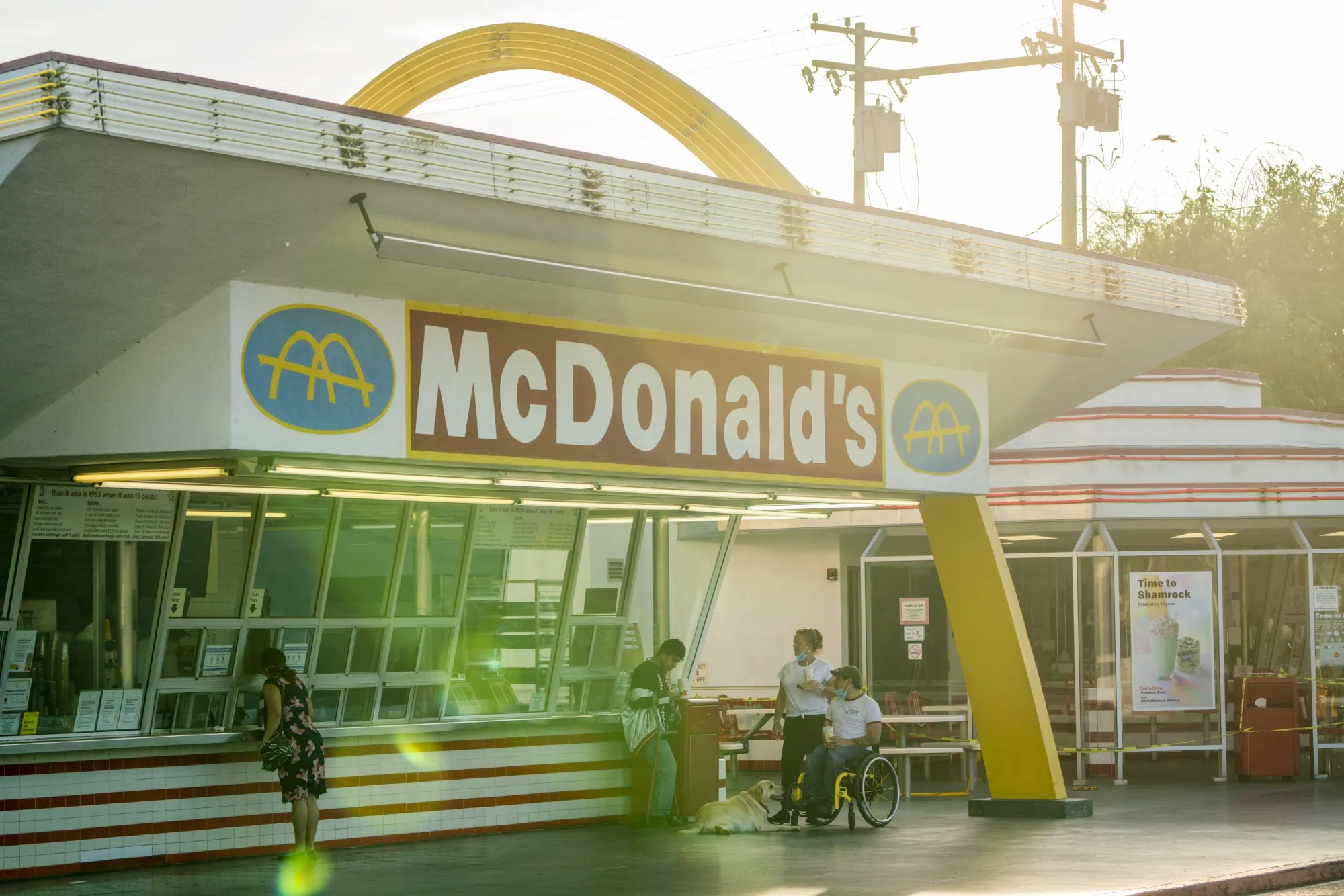 Customers order food at the oldest operating McDonald’s in Downey, California, April 27.