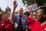 Bernie Sanders supporters hold 'Medicare for All' signs in Washington, D.C. &quot;Medicare for All&quot; has not been universally supported by Democrats in Congress.