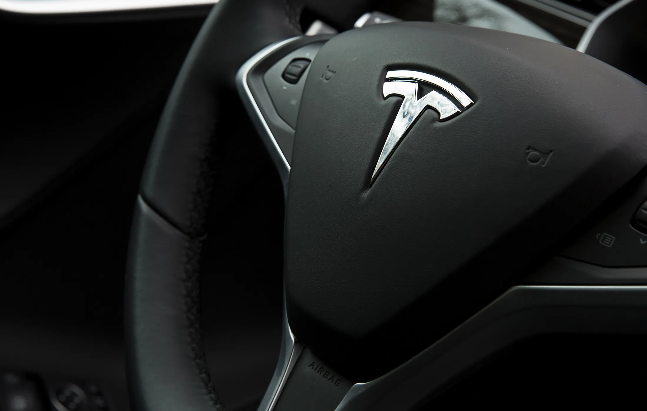 The interior view of a Tesla Motors Inc. Model S P90D, a model with some autopilot features, is seen during an exhibition featuring several self-driving cars outside of the Dirksen Senate Office Building in Washington, D.C., U.S., on Tuesday, March 15, 2016.
