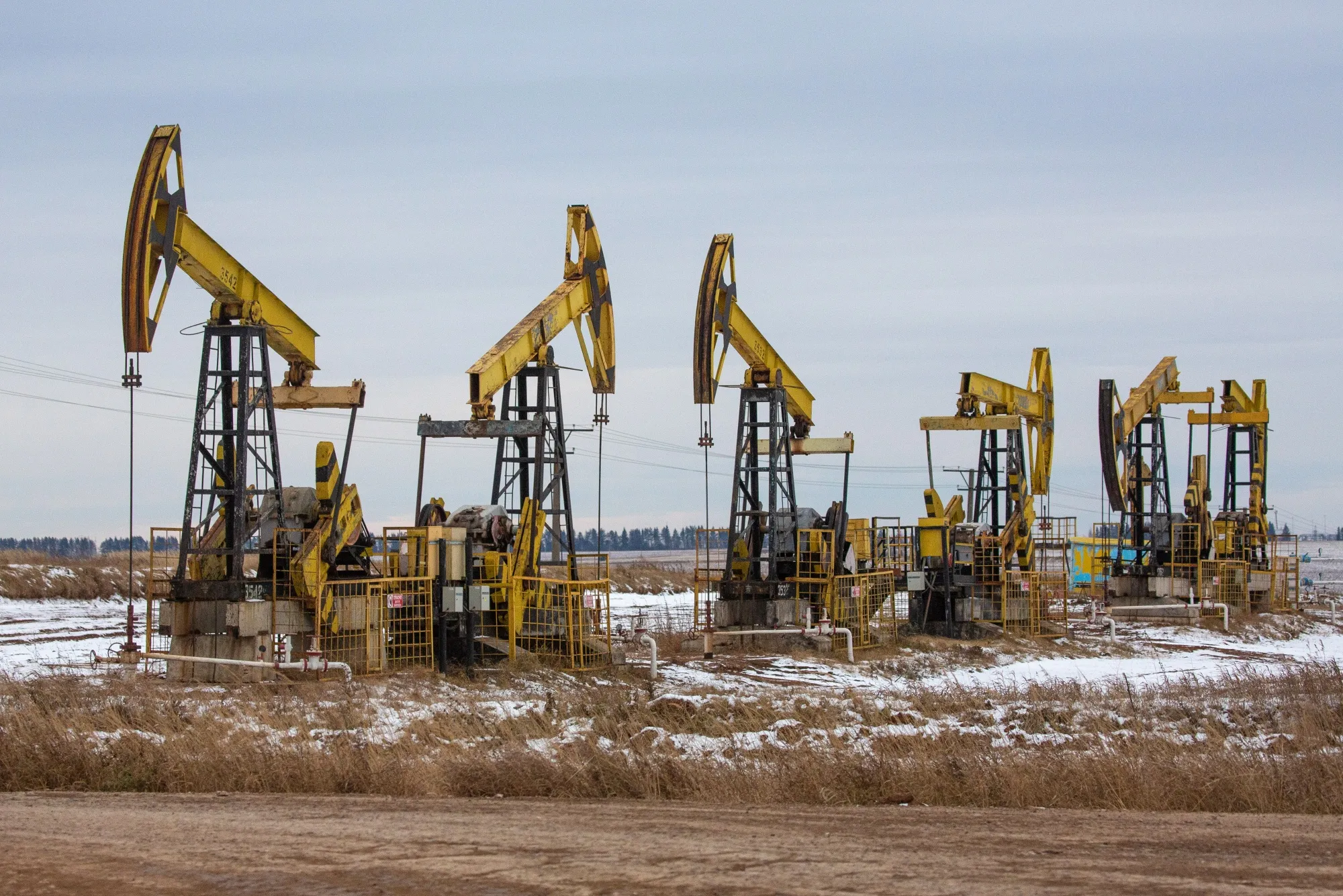 Oil pumping jacks, also known as "nodding donkeys"in a Rosneft Oil Co. oilfield near Sokolovka village, in the Udmurt Republic, Russia, on Friday, Nov. 20, 2020.&nbsp;