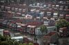Trucks sit idle in a parking lot at a logistics park in Chengdu, China, on Tuesday, April 11, 2017. Truck Alliance Inc., known as Huochebang or truck gang in Chinese, is trying to bring the smartphone age to a trillion dollar industry that carries 80 percent of the country's cargo, yet has haulers standing empty nearly half the time.
