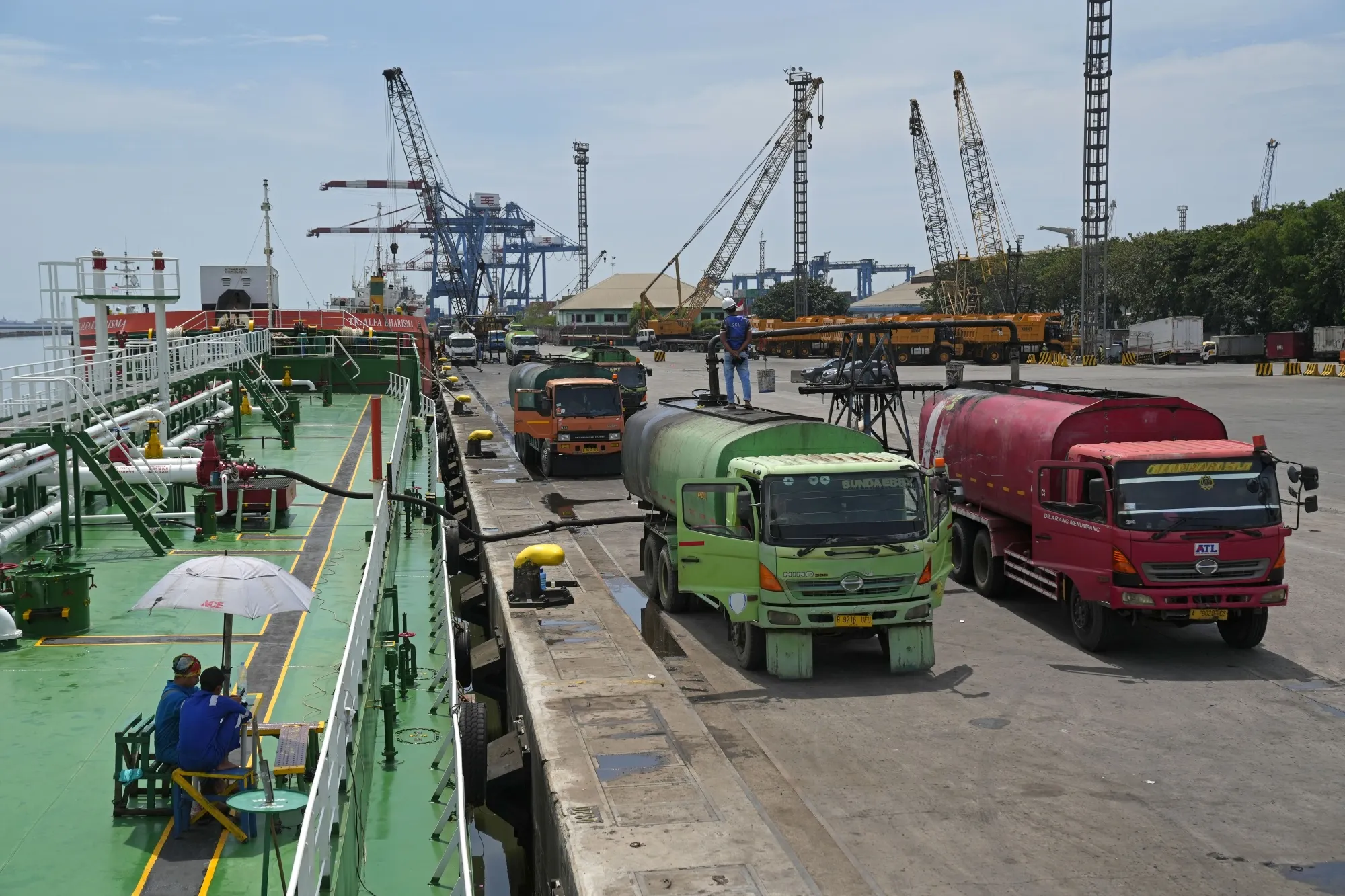 Palm oil loaded into trucks at Tanjung Priok Port in Jakarta.