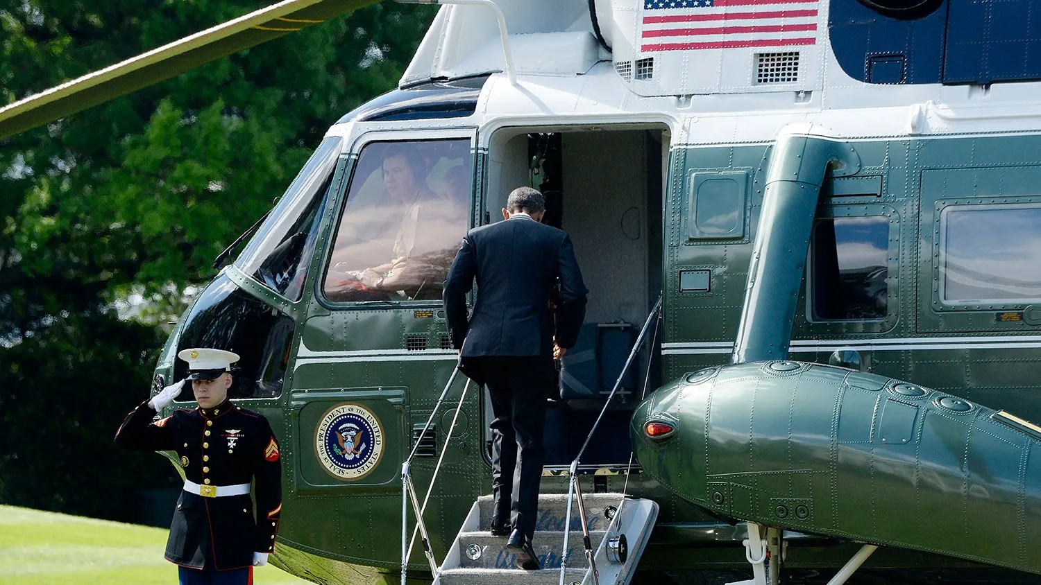 President Barack Obama boards Marine One on the South Lawn of the White House on May 15, 2016, in Washington.
