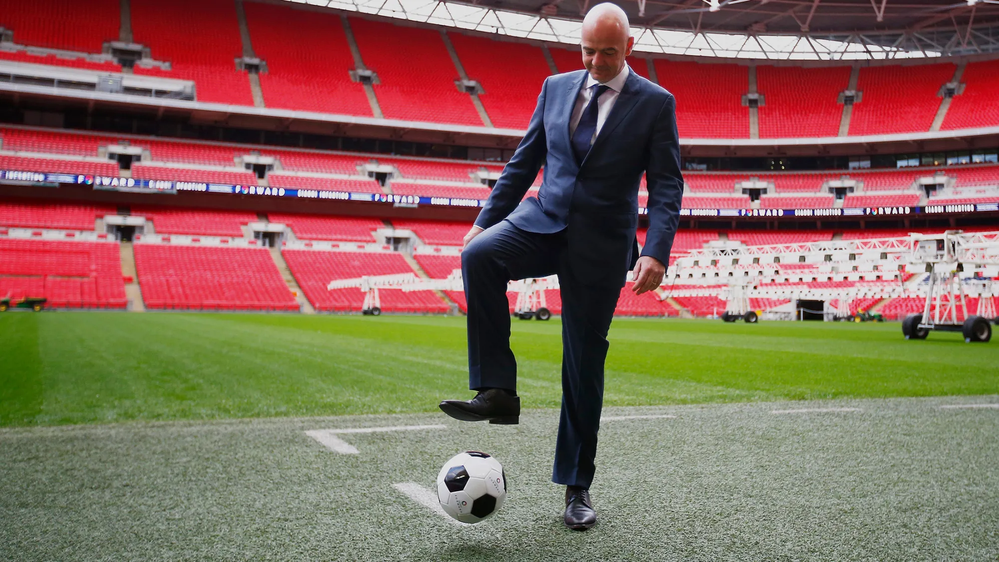 FIFA Presidential candidate Gianni Infantino controls a football after his press conference at Wembley Stadium.
