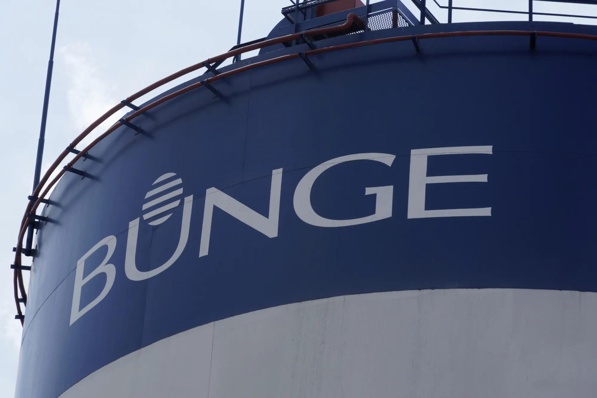 A Bunge logo on the side of a grain storage silo.