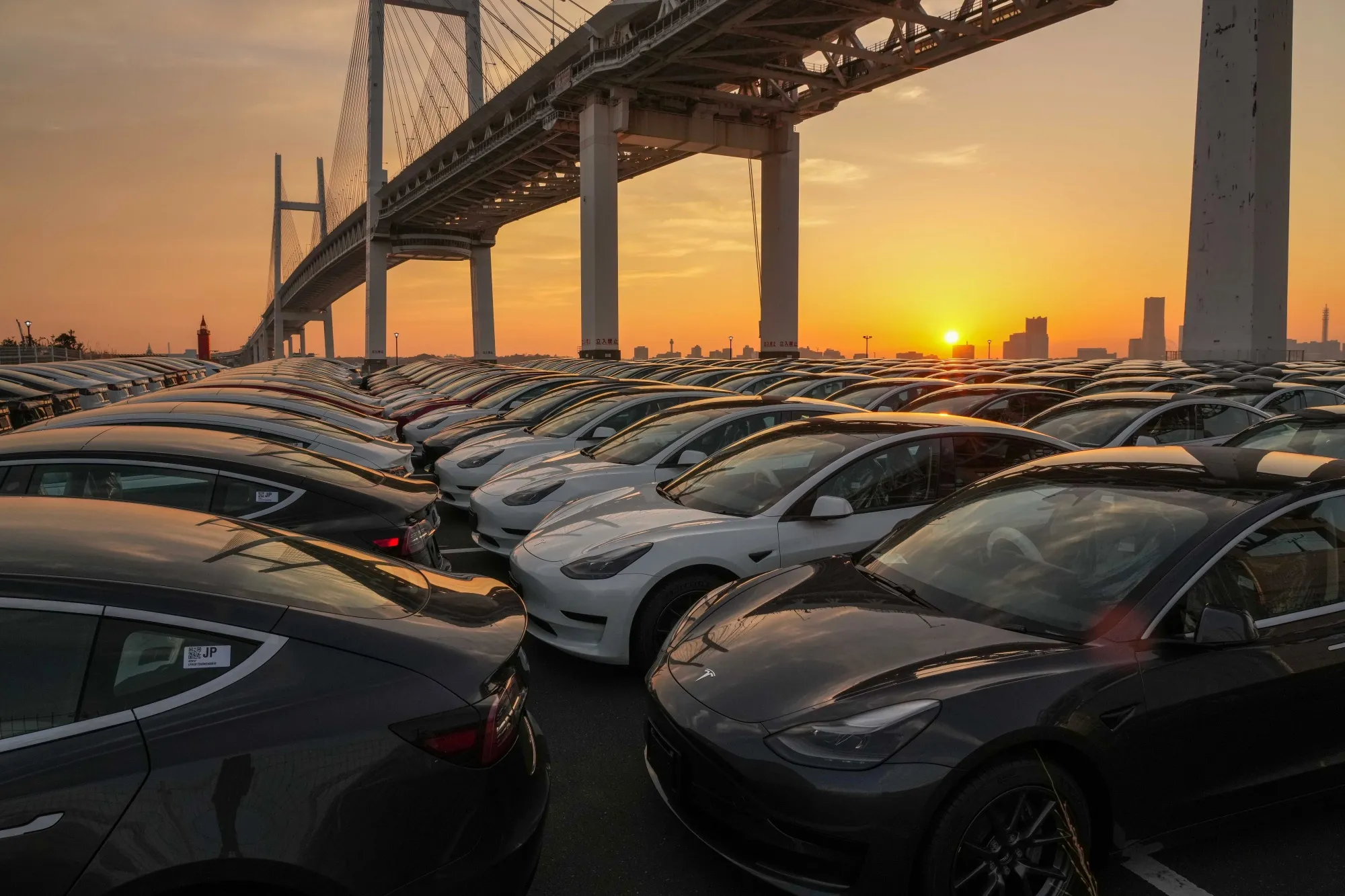 Tesla&nbsp;vehicles parked in a lot after arriving at a port in Yokohama, Japan.