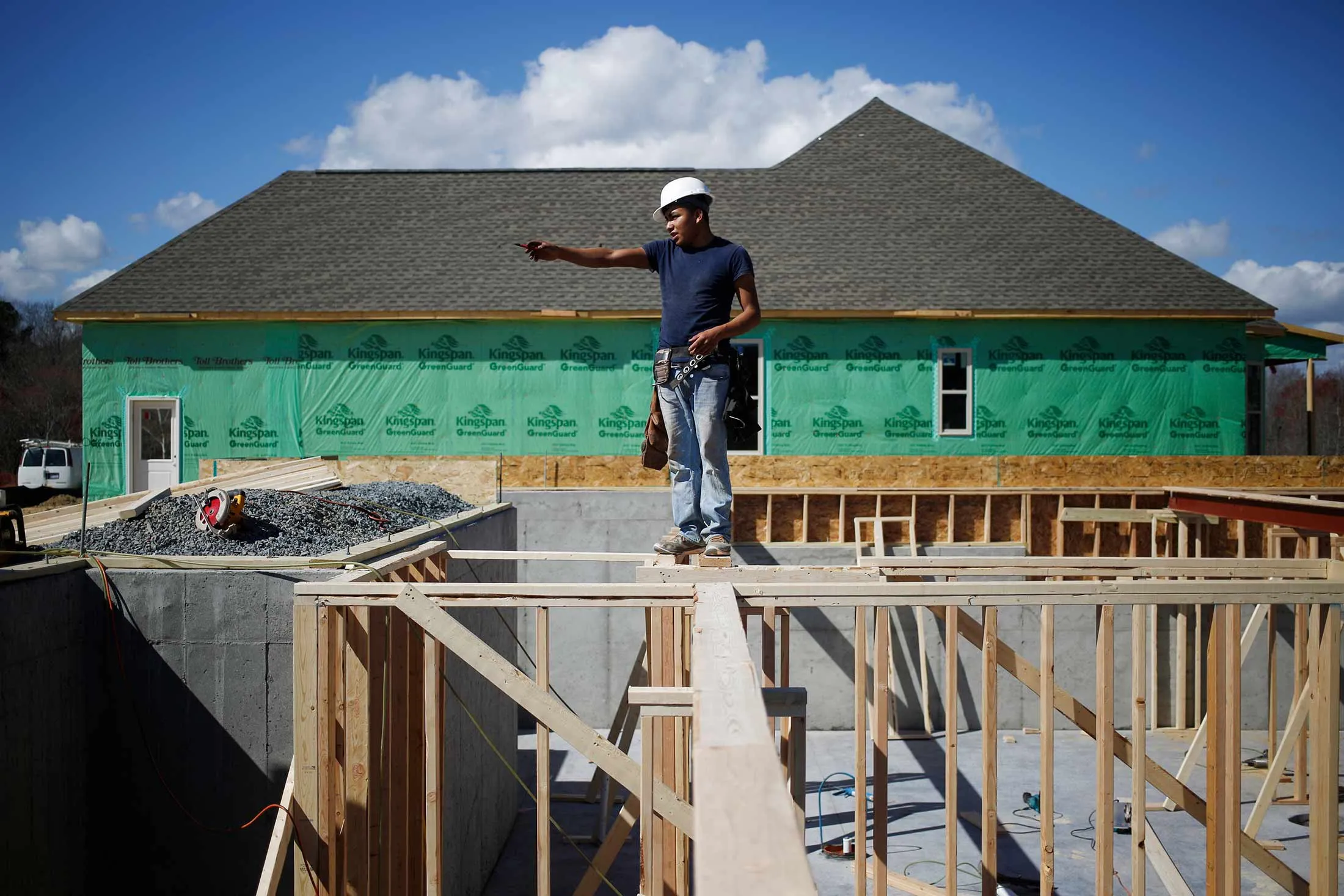 A contractor works on the basement of a home under construction in Charlotte, North Carolina.
