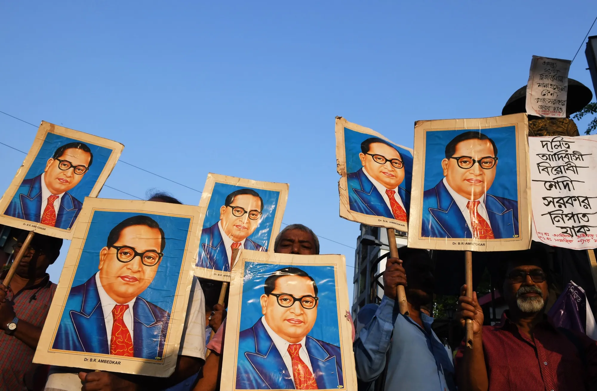 Portraits of Bhimrao Ramji Ambedkar, who argued for the abolition of caste in India.