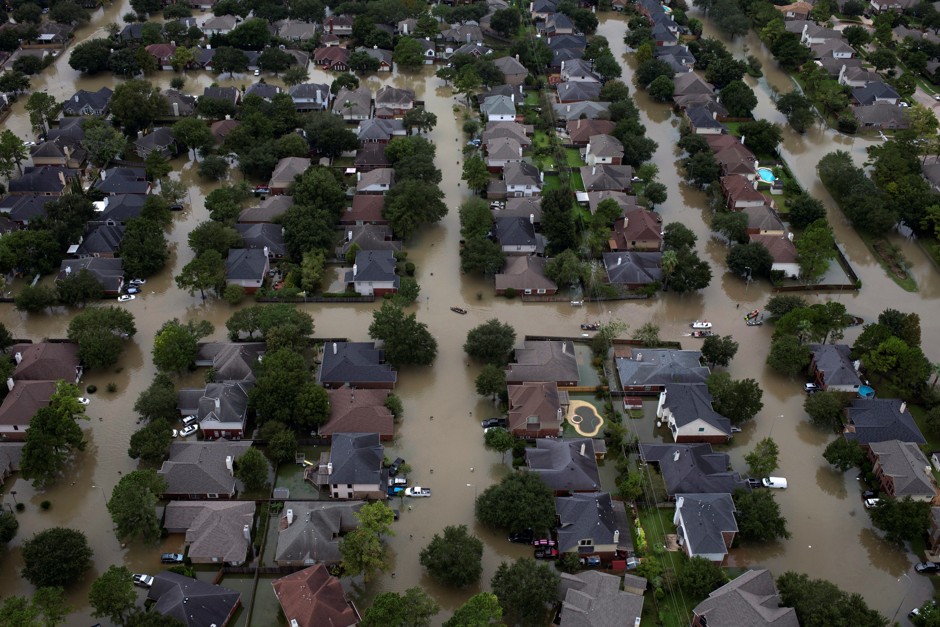 Houses submerged in flood waters caused by Hurricane Harvey in northwest Houston, August 30, 2017.