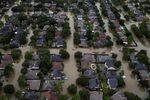 Houses submerged in flood waters caused by Hurricane Harvey in northwest Houston, August 30, 2017.