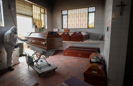 Colombia Covid Deaths Surge Toward 100,000 as Economy Reopens