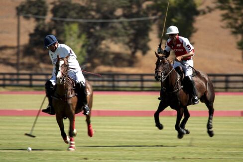 Players on Barrack's polo fields.