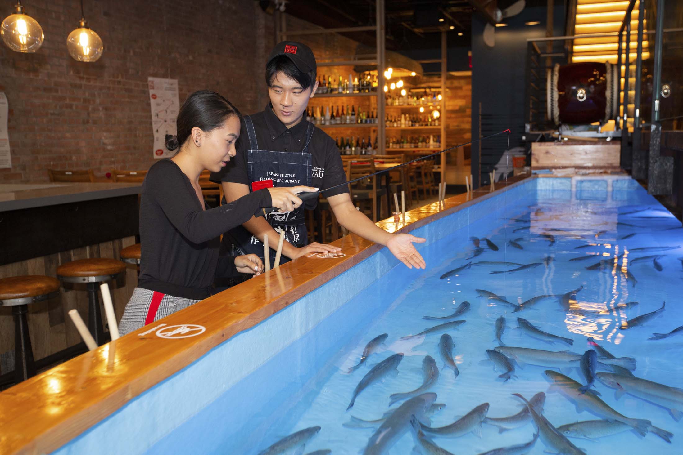 Inside Zauo New York, the Restaurant Where You Fish Your Dinner - Bloomberg
