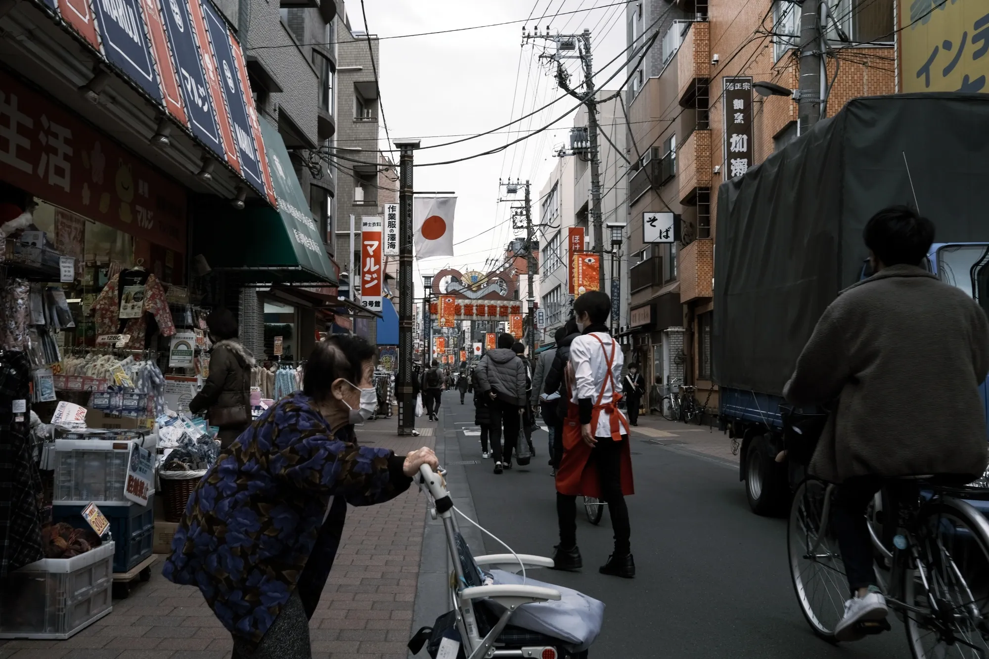 Shoppers on Sugamo Jizo-dori in Tokyo.