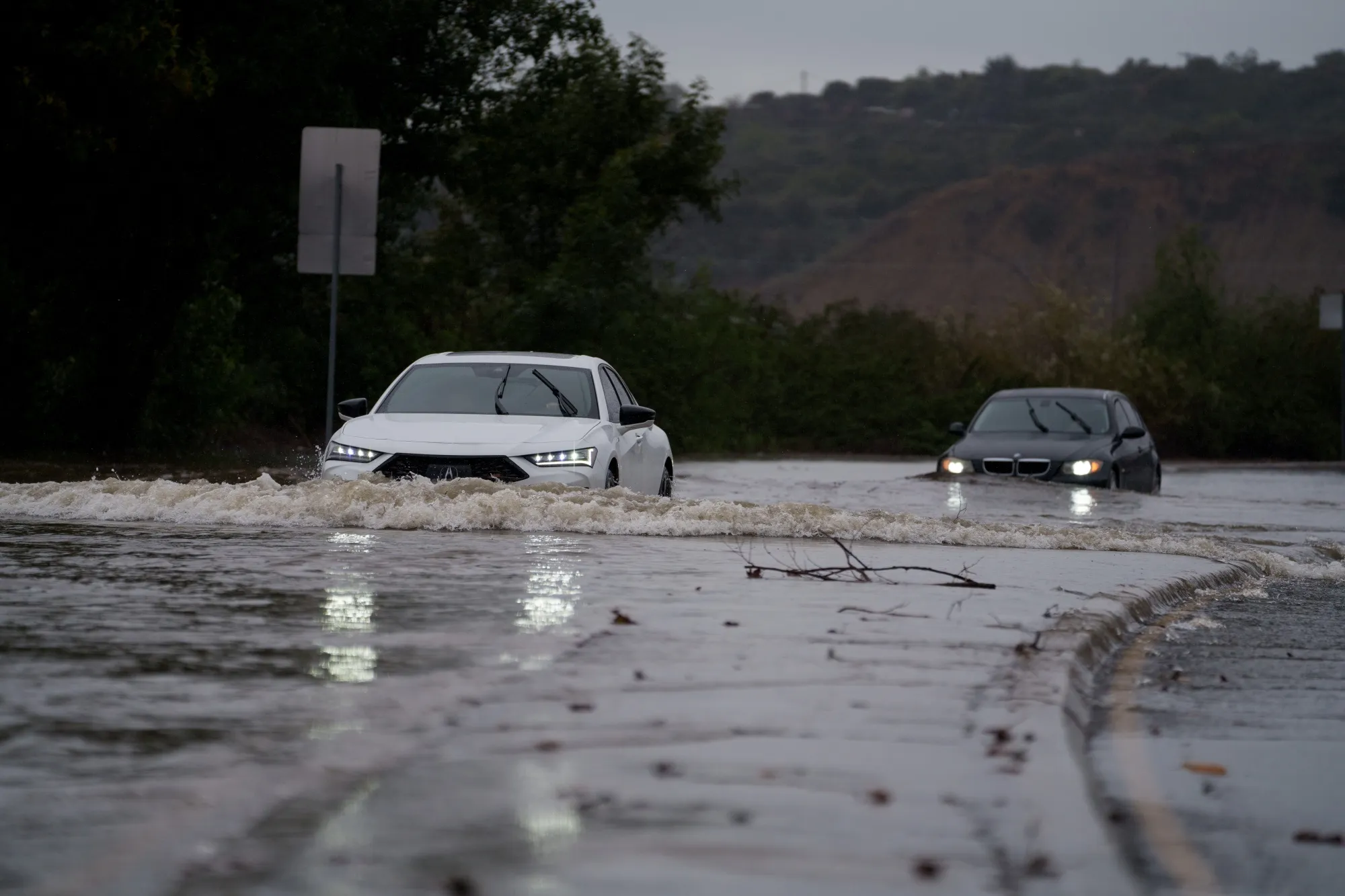 Wet winter storm hits California, closing regional airport and trapping ...