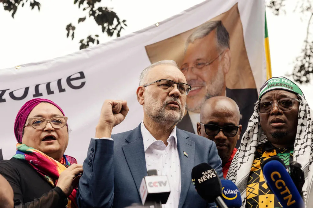 Ebrahim Rasool arrives at Cape Town International airport, March 23.
