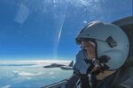 A Chinese air force pilot conducts a combat exercise around Taiwan in this image released by China's Eastern Theater Command on Aug. 7.