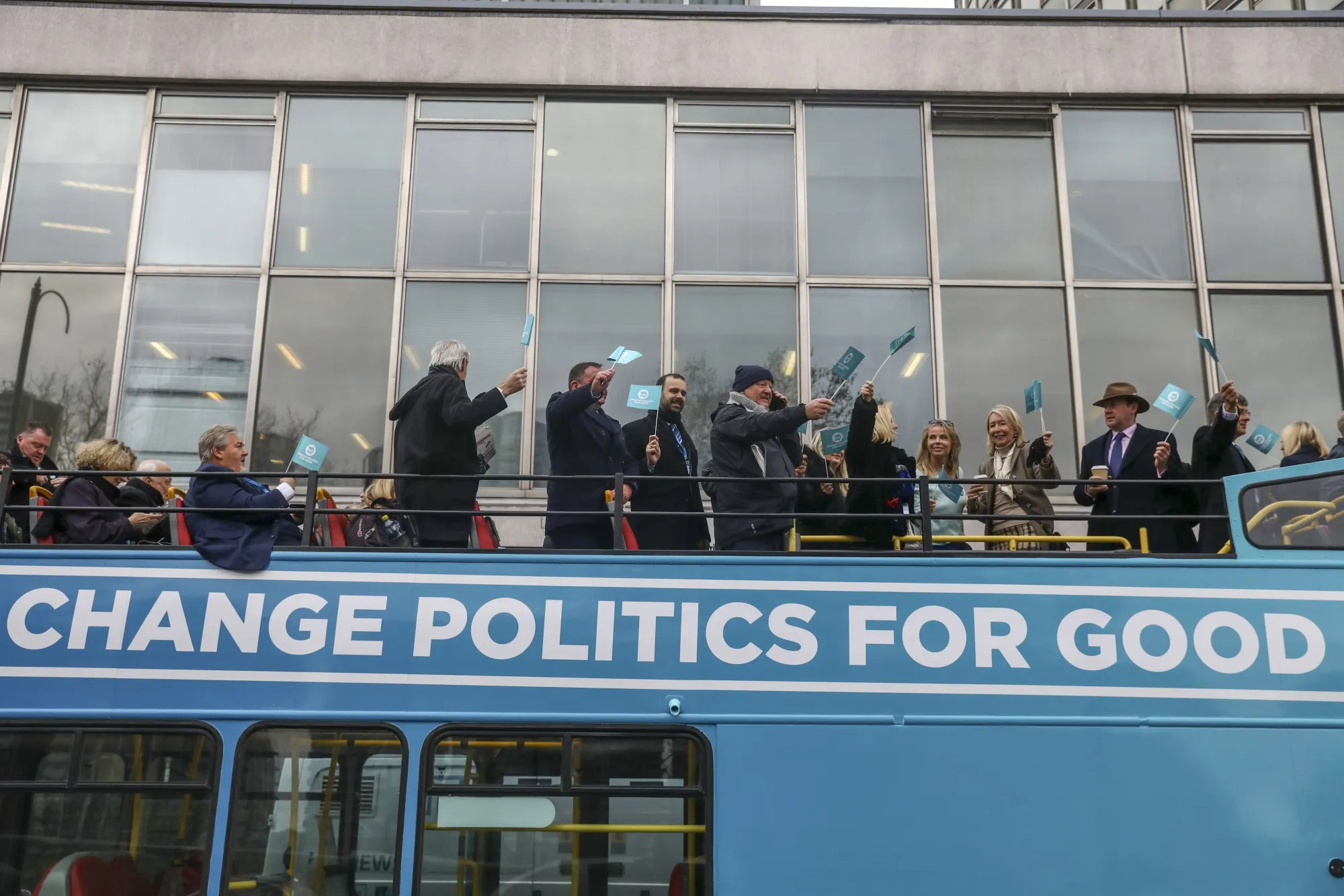 Supporters of the Brexit Party stand on the top deck of an open-topped bus following an announcement of the party's general election polices in London on Nov. 22.