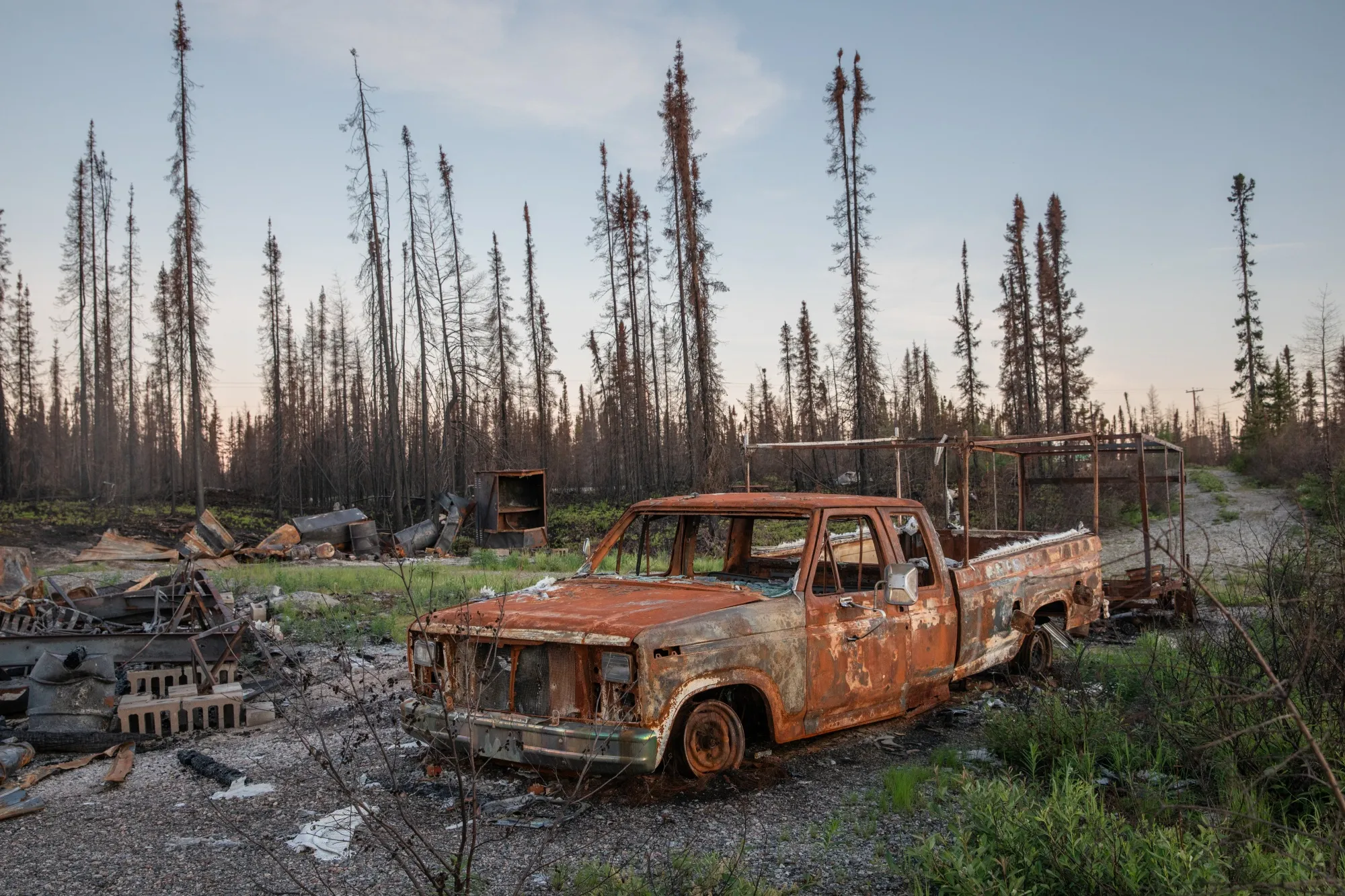 A burnt vehicle after a wildfire in the Baie-James region of Quebec, Canada, on&nbsp;June 10.