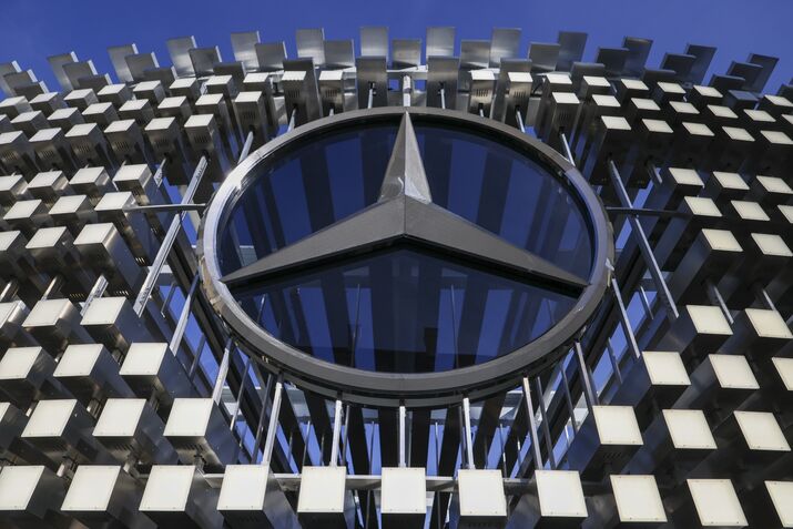 A Mercedes-Benz logo.