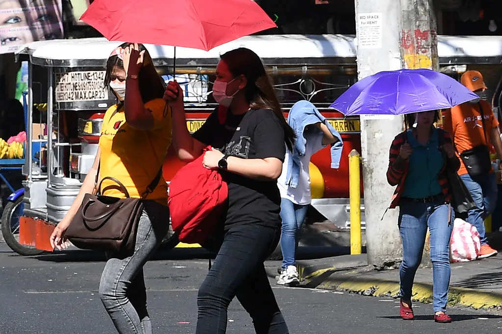 People during a heatwave in Manila on April 29.