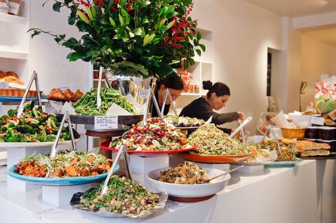Delicatessen-style salads and vegetable dishes will be a centerpiece, as in the Islington location shown here.