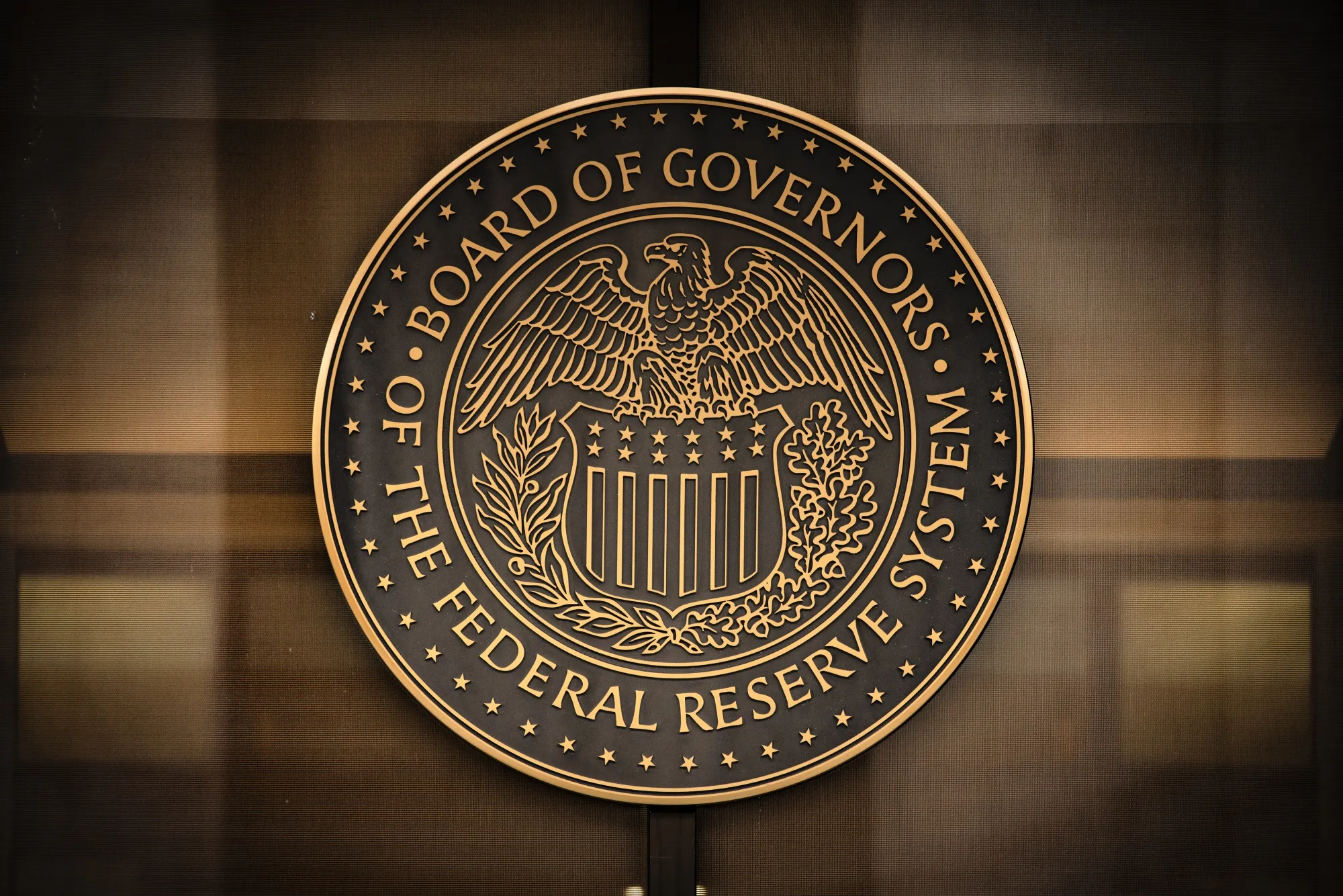 The seal of the U.S. Federal Reserve Board of Governors across the street from the Marriner S. Eccles Federal Reserve building in Washington, D.C., U.S.