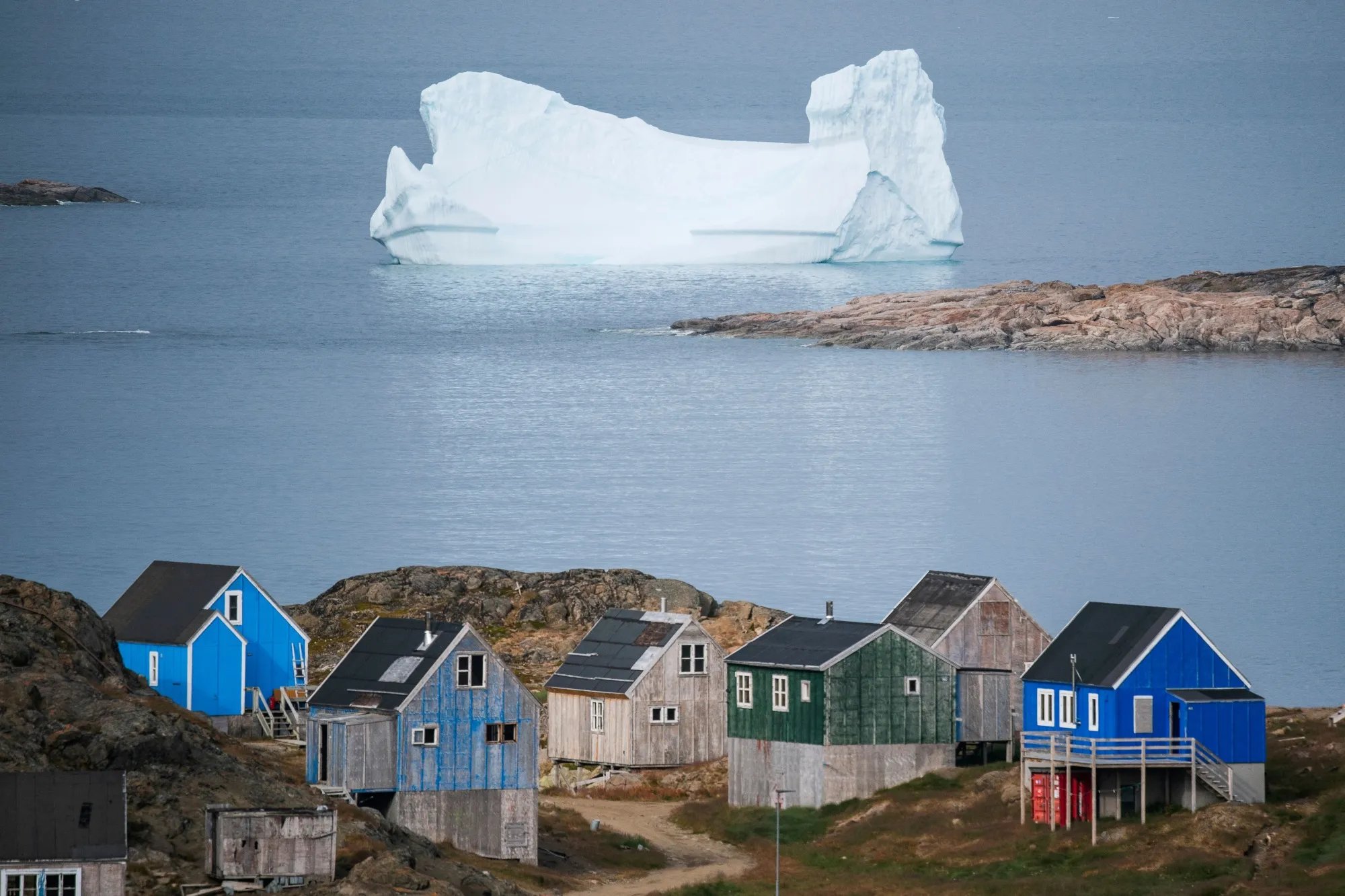 Not for sale:&nbsp;Icebergs float behind the town of Kulusuk in Greenland.