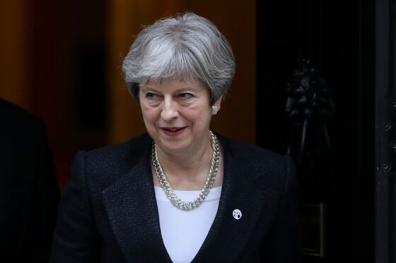 Theresa May Weighs Move to Restrict No-Deal Brexit Threat