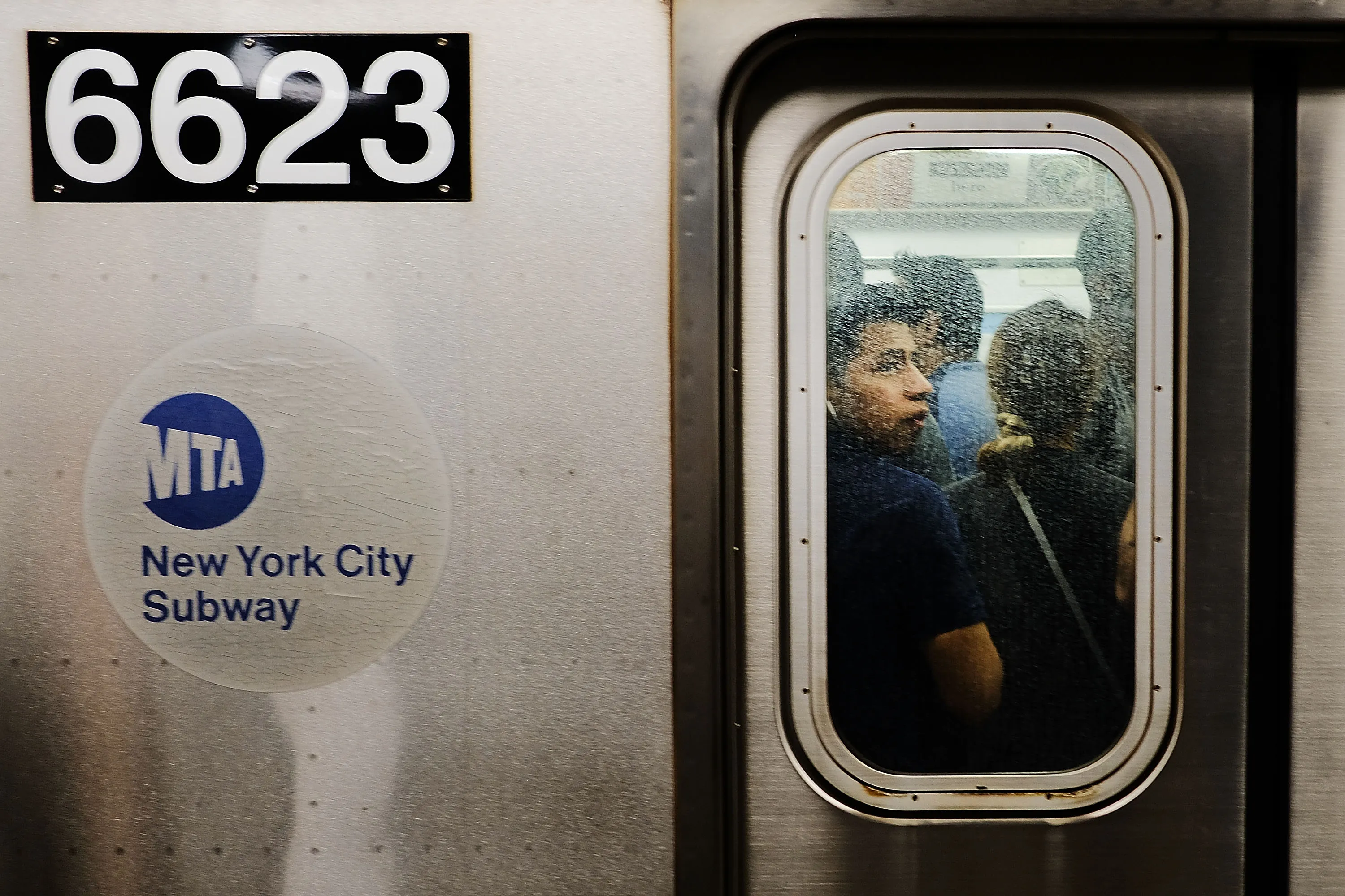 Passengers ride a Metropolitan Transportation Authority subway in New York City.&nbsp;