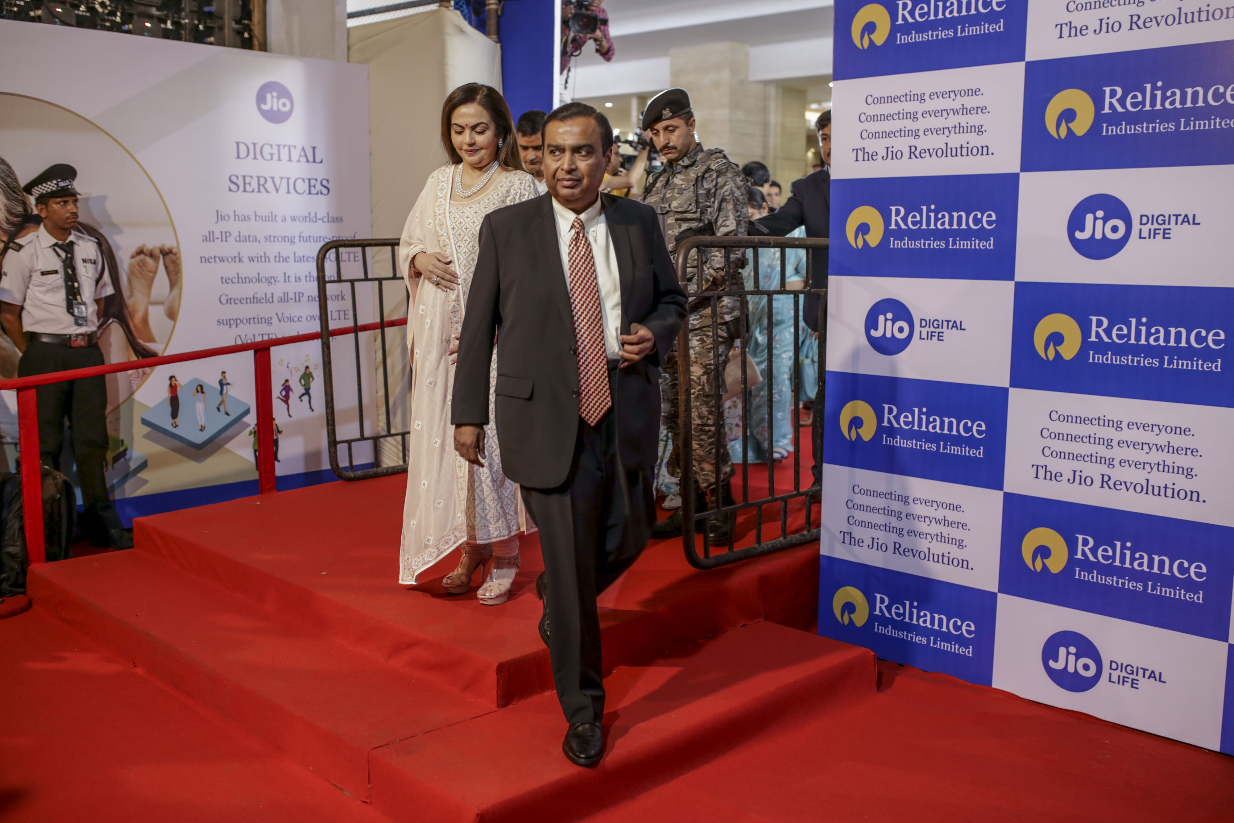 Mukesh Ambani, right, and his wife Nita Ambani, left,&nbsp;in 2019.