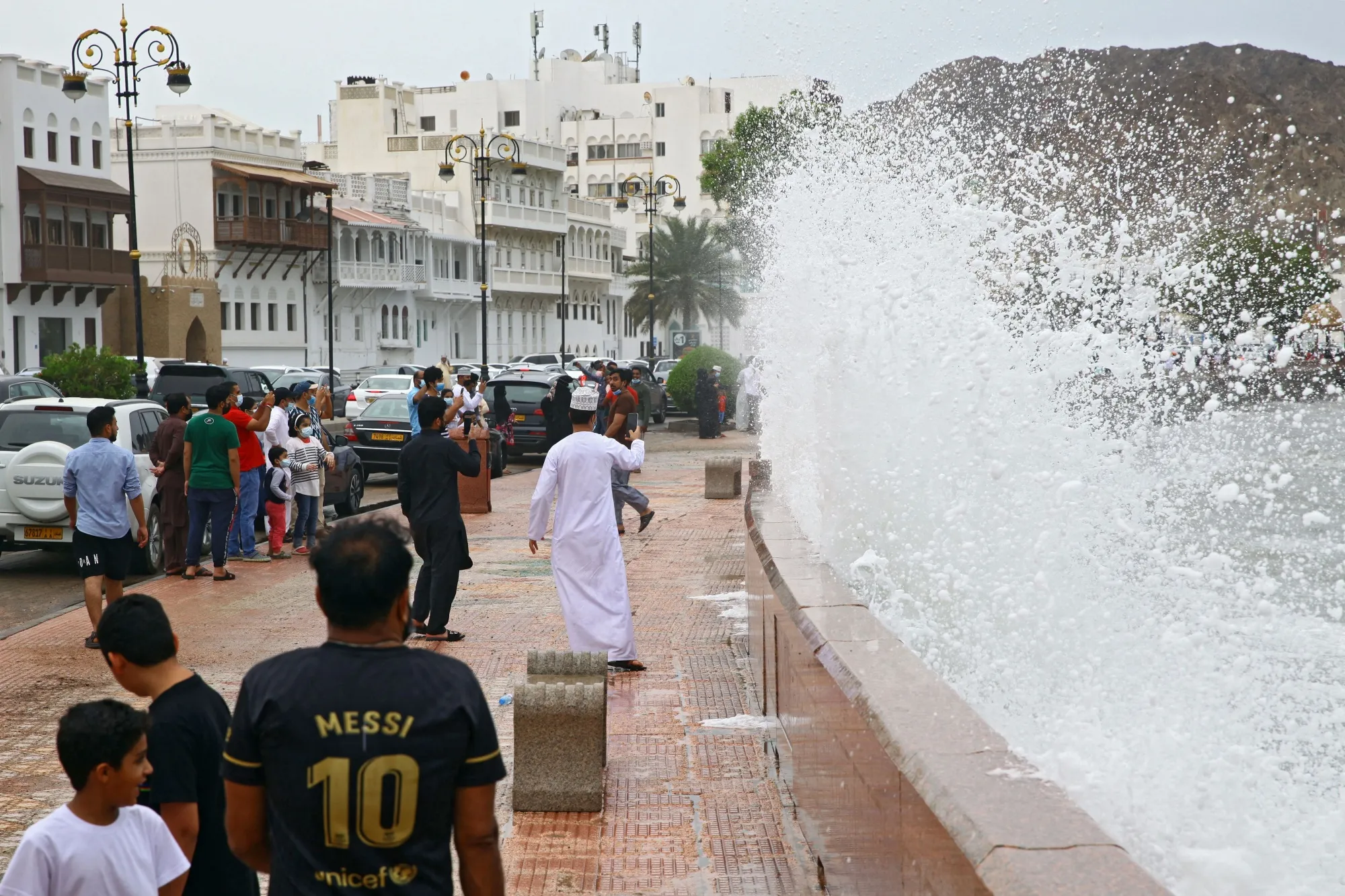 High waves break on the sea side promenade in the Omani capital Muscat on Oct.&nbsp;2.