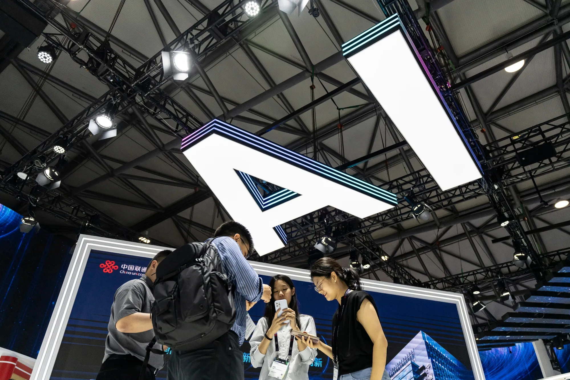 Signage for artificial intelligence at the MWC Shanghai tech show in June 19.