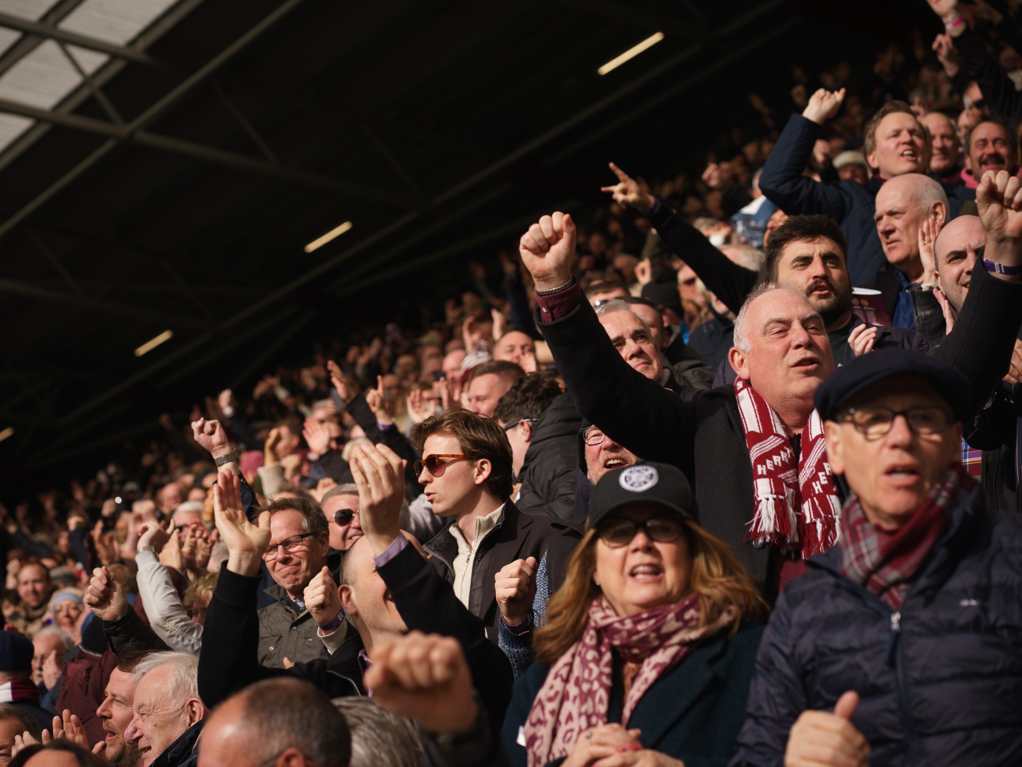 Hearts fans celebrate Lawrence Shankland's goal from a penalty kick.