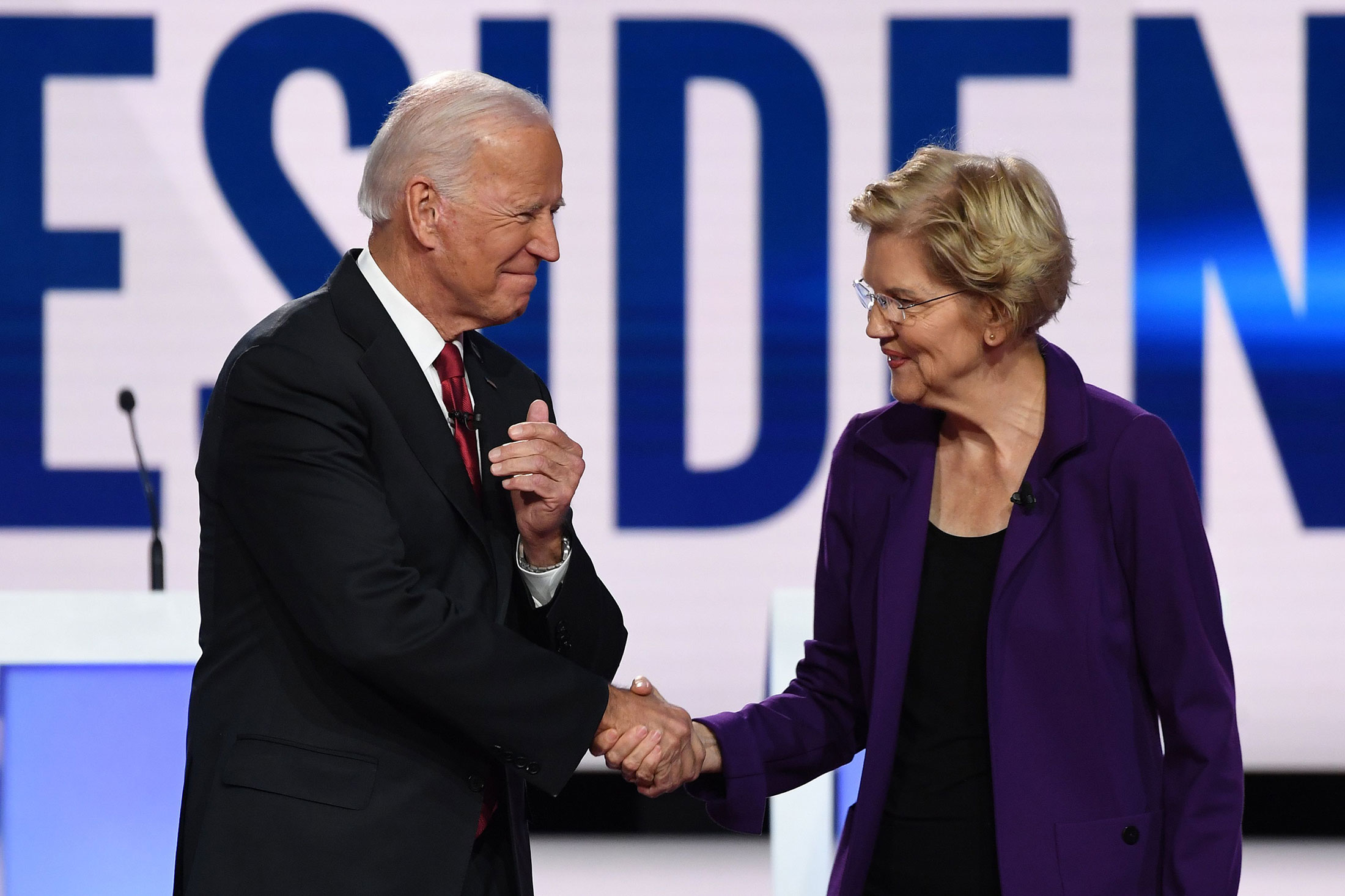 Former Vice President Joe&nbsp;Biden and Senator Elizabeth Warren shake hands ahead of the fourth Democratic primary debate on Oct.&nbsp;15, 2019.