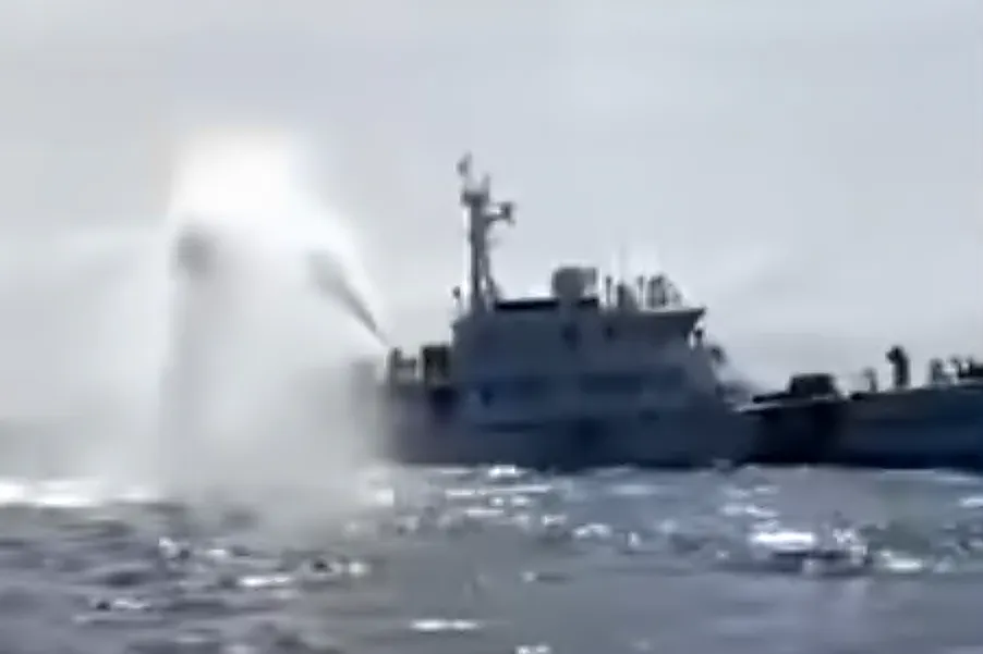 A video grab showing a&nbsp;Chinese coast guard ship firing&nbsp;water cannon, in the South China Sea, Dec. 13.