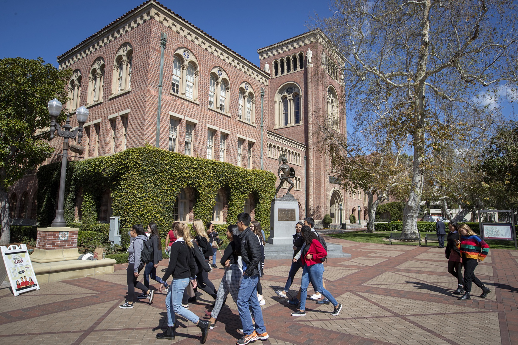 OJ Simpson stands on the side lines during a University of Southern