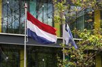 A national flag flies outside the Dutch finance ministry headquarters in The Hague, Netherlands.