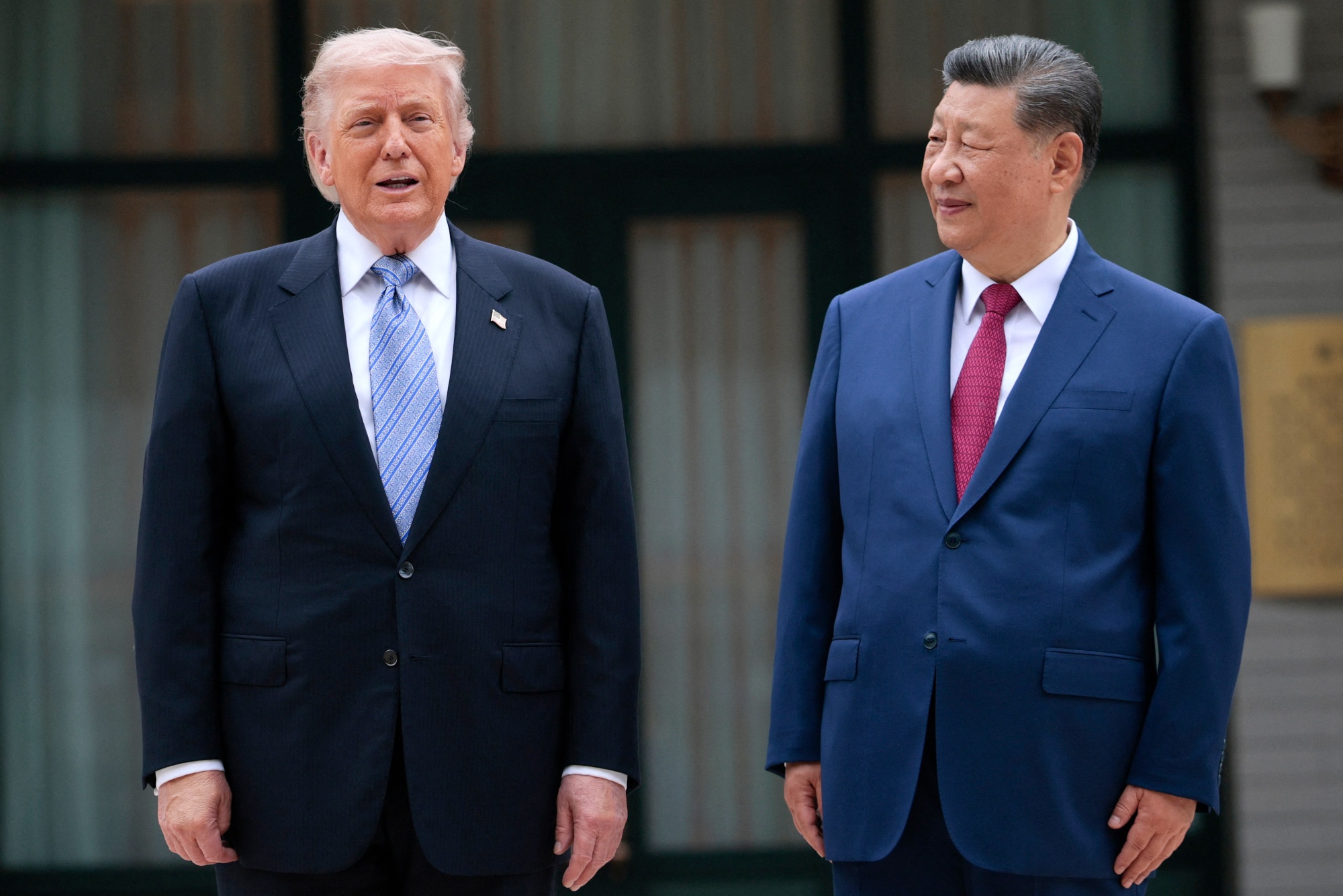 Donald Trump poses for photos with Xi Jinping at Zhongnanhai Garden in Beijing on May 15.