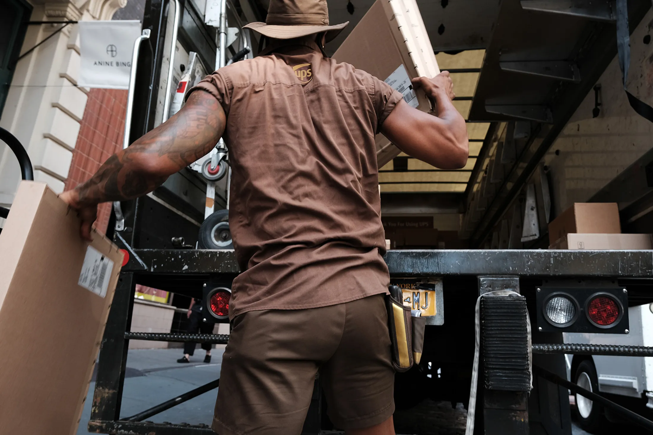 A UPS&nbsp;worker&nbsp;delivers packages&nbsp;in New York.