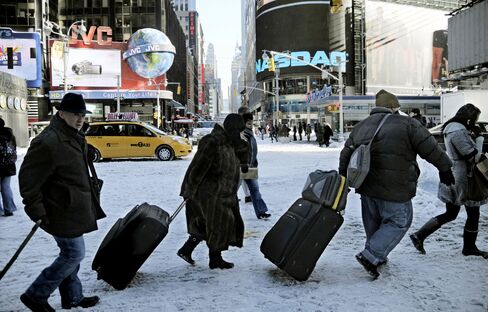 Wind-Driven Snow Blankets East Coast, Shuts Airports