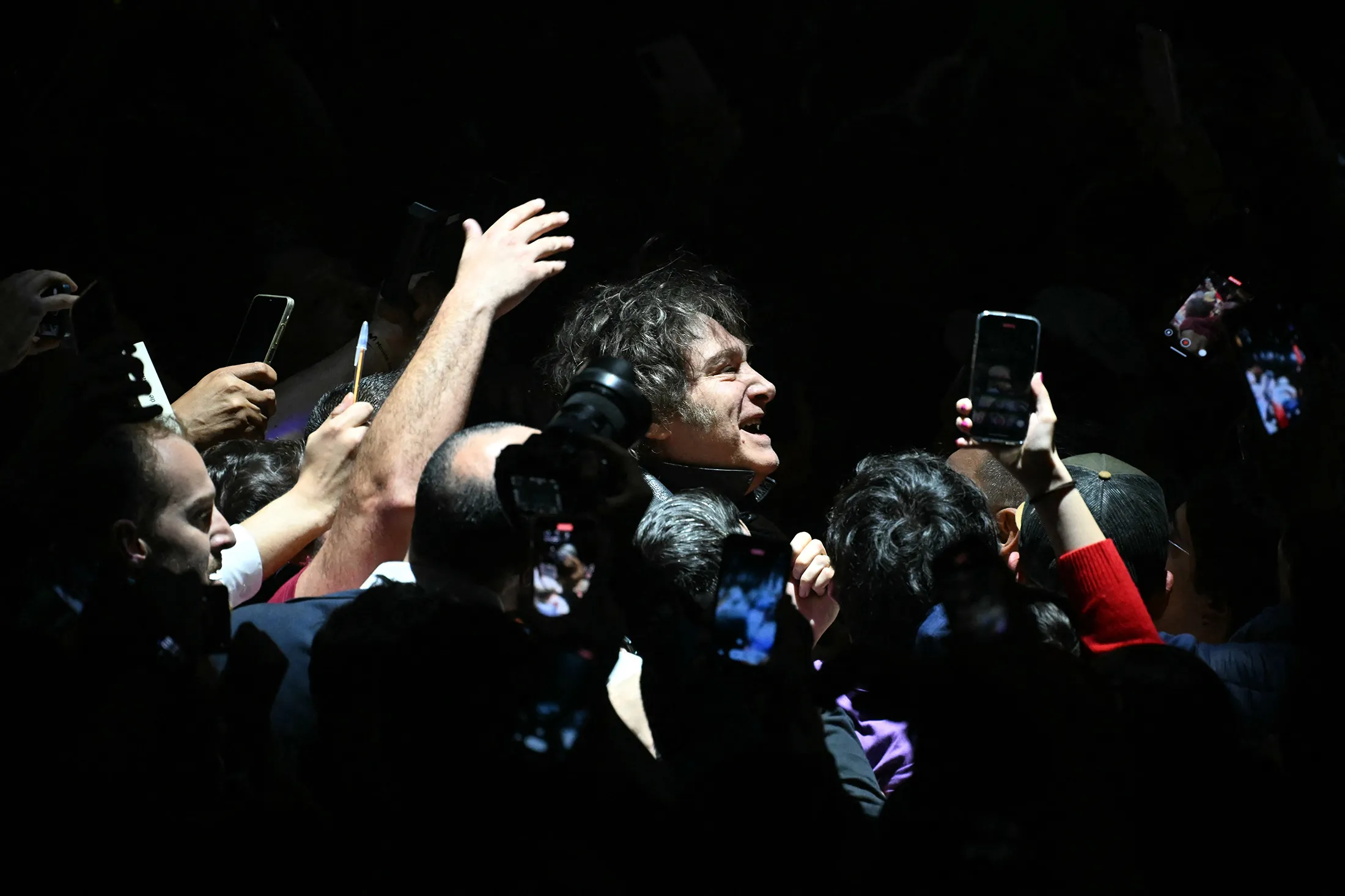 Argentina's President Javier Milei&nbsp;arrives on Monday for the launch of his book, The Making of the Miracle,&nbsp;at the Movistar Arena in Buenos Aires.