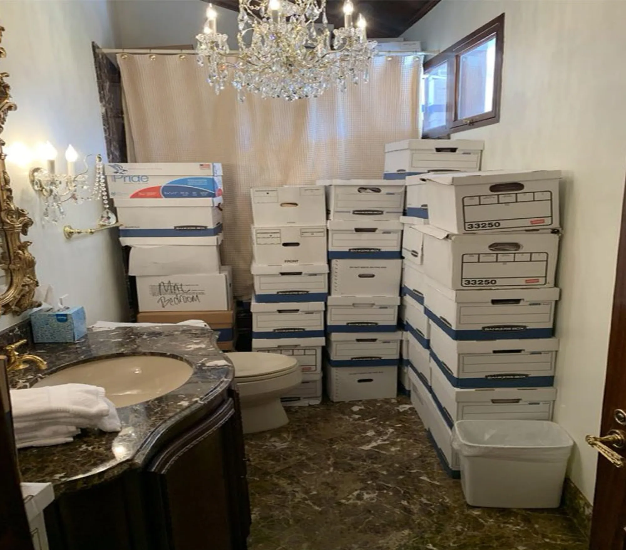 This image, contained in the indictment against Trump, shows boxes of records stored in a bathroom&nbsp;at his Mar-a-Lago estate in Palm Beach, Fla.&nbsp;