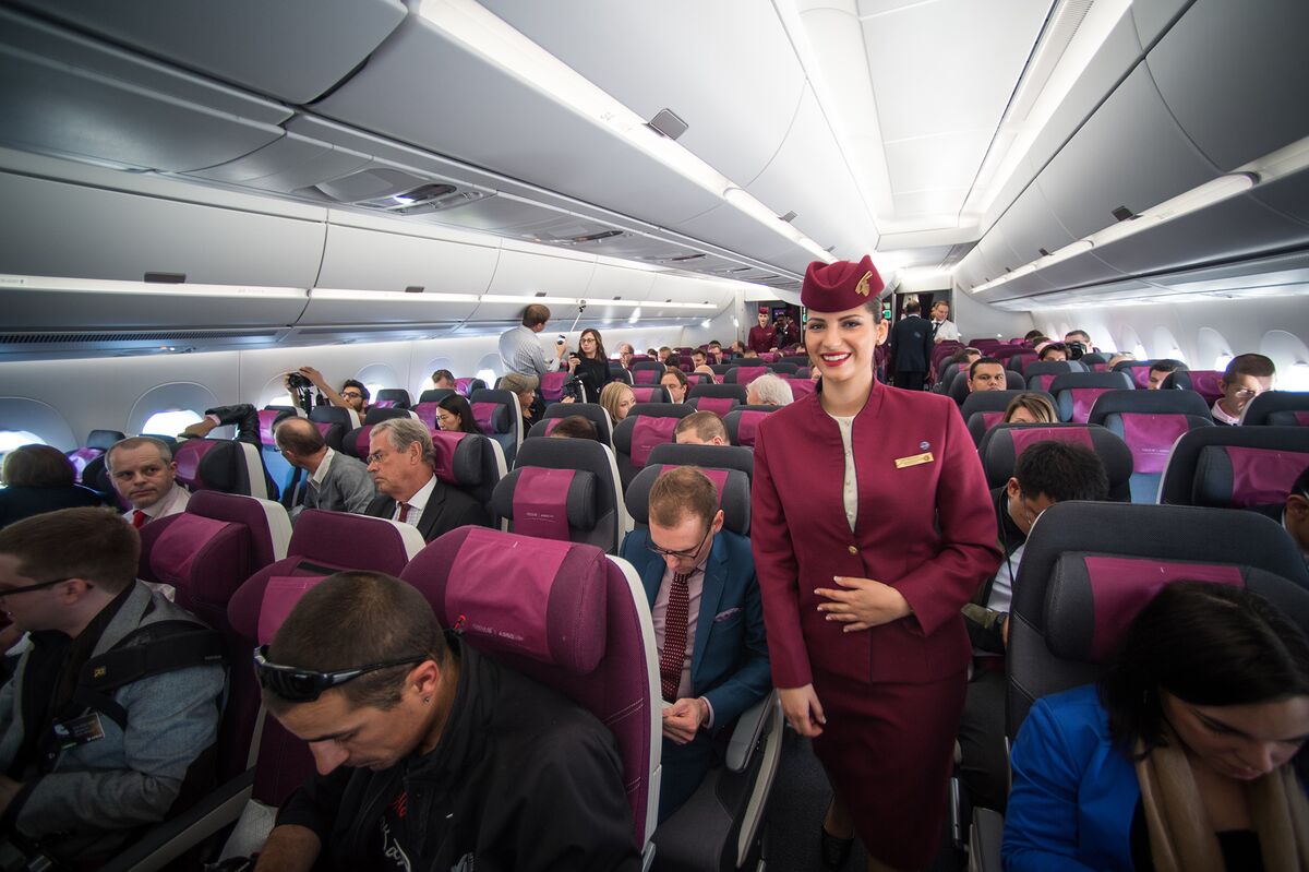 Qatar Air Relaxes Grip On Flight Attendants As Carrier Grows Up Bloomberg   1200x799 