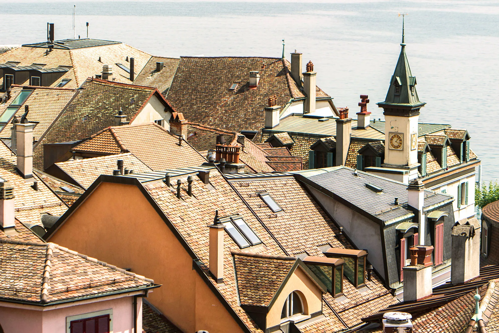 NYON, SWITZERLAND - AUGUST 13: Residential apartment blocks stand on August 13, 2015 in Nyon, Switzerland. Risks to the Swiss real estate market increased marginally in the second quarter as growth in home prices and mortgages outpaced that of income.
