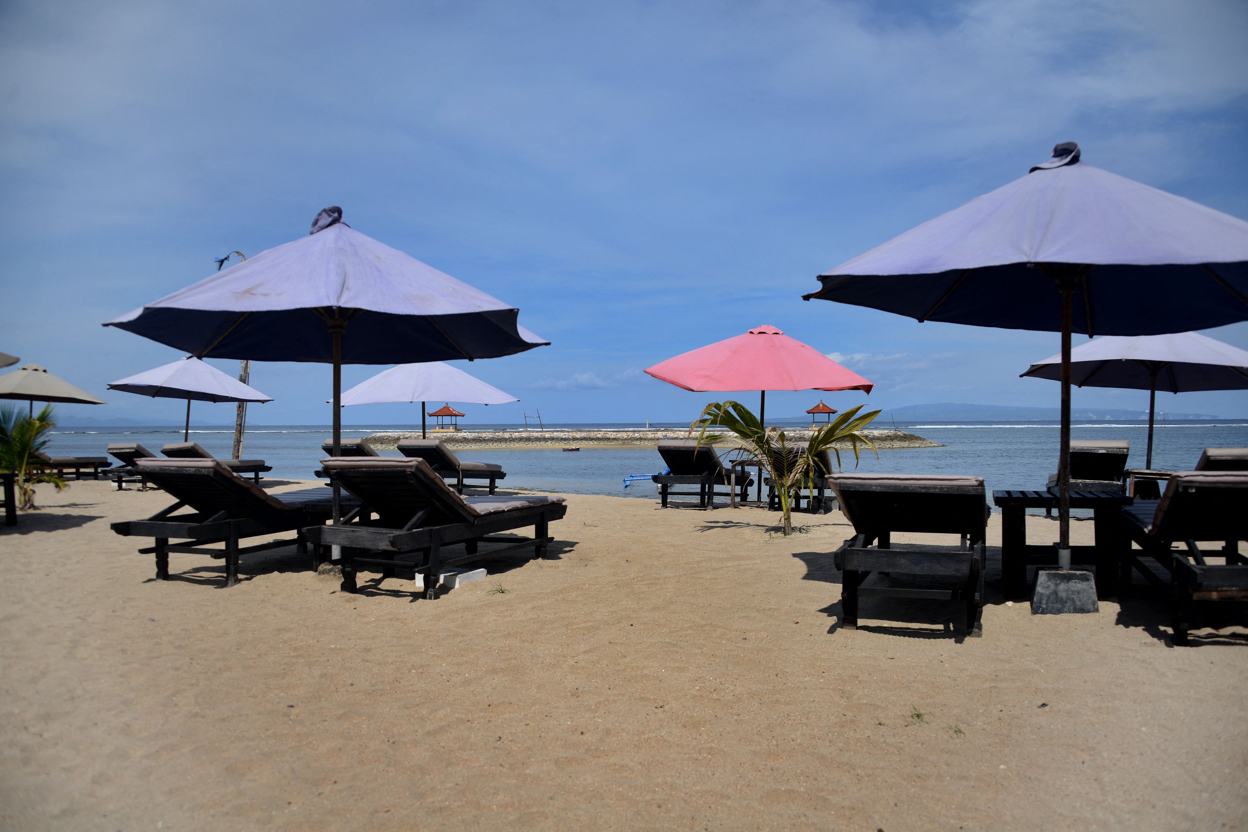 Empty deck chairs along a beach in Sanur, near Denpasar in&nbsp;Bali, Indonesia, on Oct. 14.