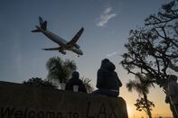 Travelers At LAX Airport As U.S. Holiday Air Travel Surges 