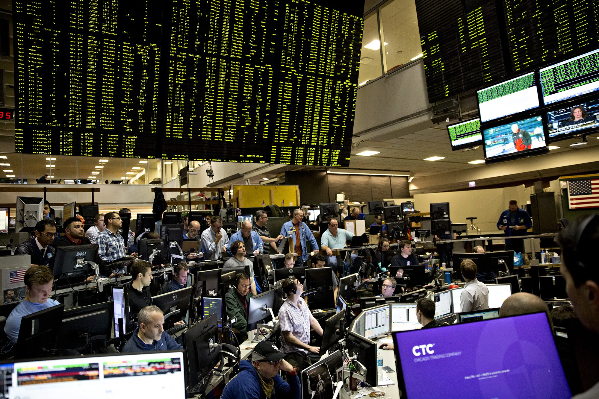 Traders work in the Cboe Volatility Index pit on the floor of the Cboe Global Markets, Inc. exchange in Chicago.