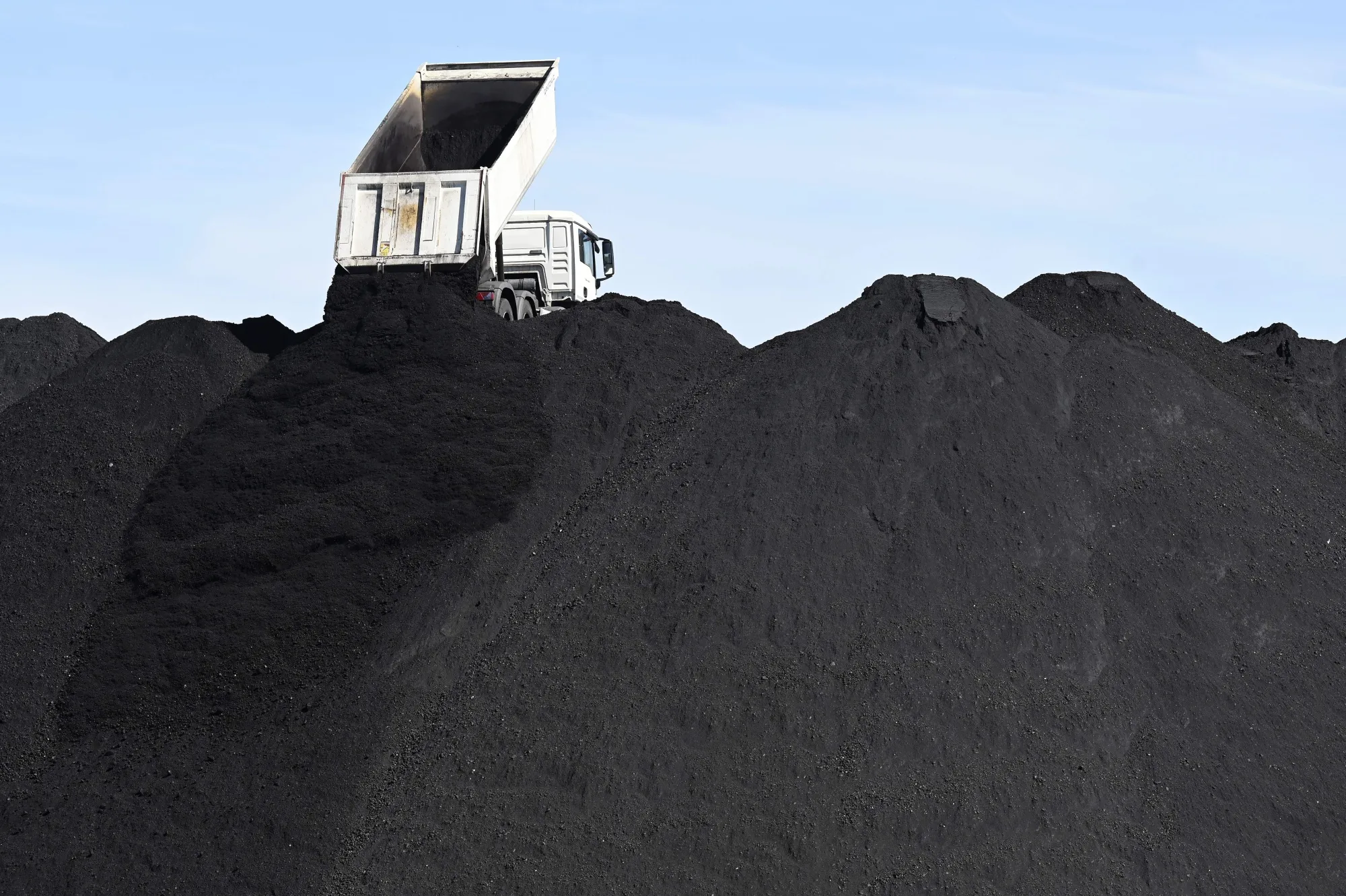 A truck dumping coal at the Emile-Huchet thermal power, coal and combined gas plant in Saint-Avold and Carling, France.&nbsp;